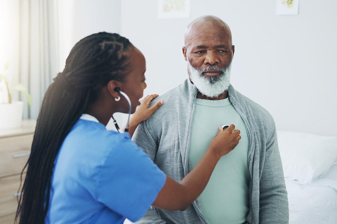 A nurse checking a patient with respiratory problems